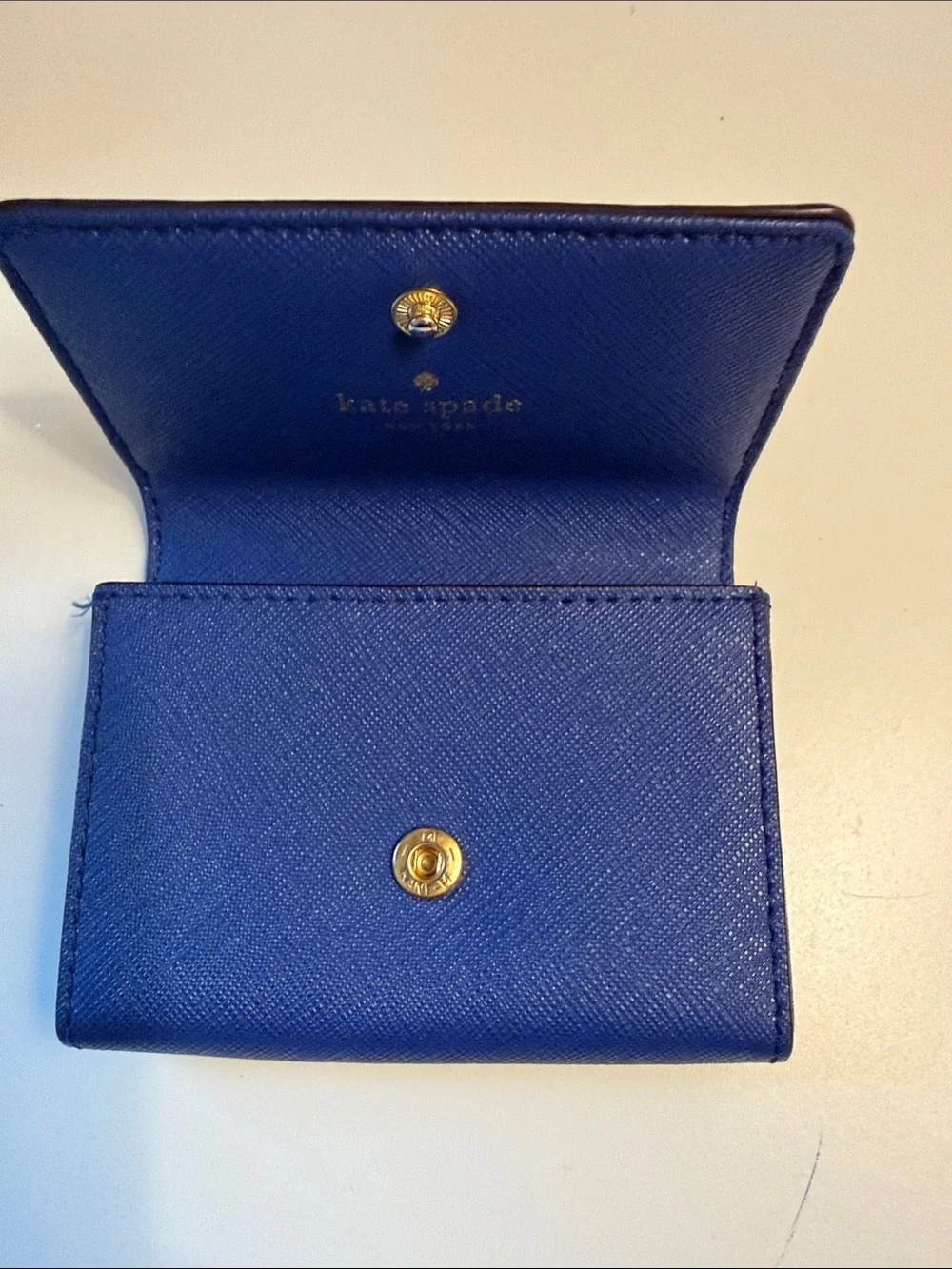 kate spade cobalt blue Saffiano leather compact wallet with gold plaque